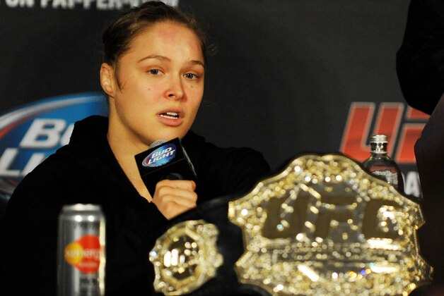 Feb 22, 2014; Las Vegas, NV, USA; UFC women's bantamweight champion Ronda Rousey answers questions from reporters after defending her title against Sara McMann in the first round of the main event of UFC 170 at Mandalay Bay.  Mandatory Credit: Stephen R. Sylvanie-USA TODAY Sports