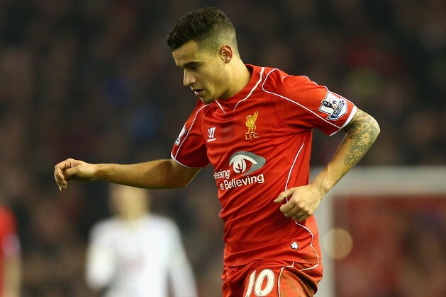 LIVERPOOL, ENGLAND - FEBRUARY 10:  Philippe Coutinho of Liverpool in action during the Barclays Premier League match between Liverpool and Tottenham Hotspur at Anfield on February 10, 2015 in Liverpool, England.  (Photo by Clive Brunskill/Getty Images)