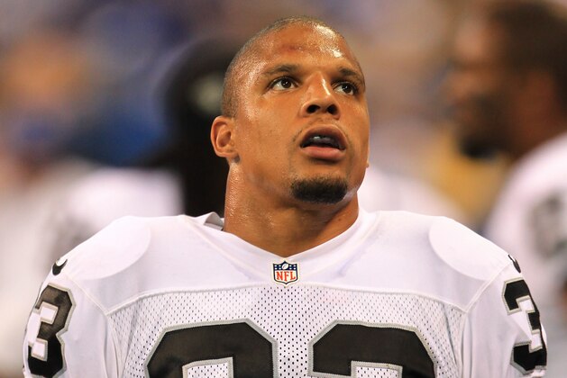 Sep 8, 2013; Indianapolis, IN, USA;  Oakland Raiders strong safety Tyvon Branch (33) during the game against the Indianapolis Colts at Lucas Oil Stadium. Mandatory Credit: Pat Lovell-USA TODAY Sports