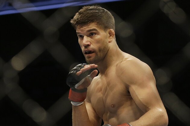 Josh Thomson fights Bobby Green in a lightweight mixed martial arts bout at a UFC on Fox event in San Jose, Calif., Saturday, July 26, 2014. Green won by split decision. (AP Photo/Jeff Chiu)