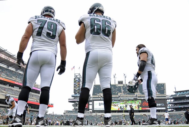 Sep 21, 2014; Philadelphia, PA, USA; Philadelphia Eagles guard Todd Herremans (79) and tackle Andrew Gardner (66) and center Jason Kelce (62) during pre game warmups before game against the Washington Redskins at Lincoln Financial Field. Mandatory Credit: Eric Hartline-USA TODAY Sports