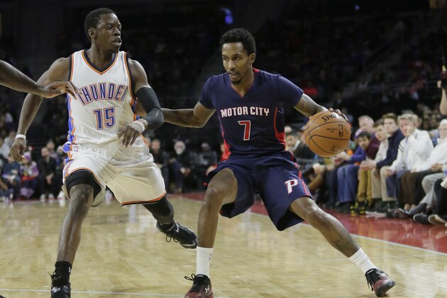 Detroit Pistons' Brandon Jennings (7) drives against Oklahoma City Thunder's Reggie Jackson during the second half of an NBA basketball game Sunday, Dec. 7, 2014, in Detroit. The Thunder defeated the Pistons 96-94. (AP Photo/Duane Burleson)