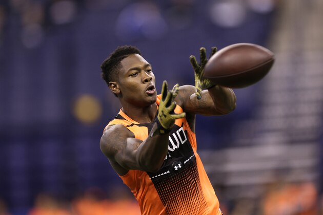 Maryland wide receiver Stefon Diggs runs a drill at the NFL football scouting combine in Indianapolis, Saturday, Feb. 21, 2015. (AP Photo/David J. Phillip)
