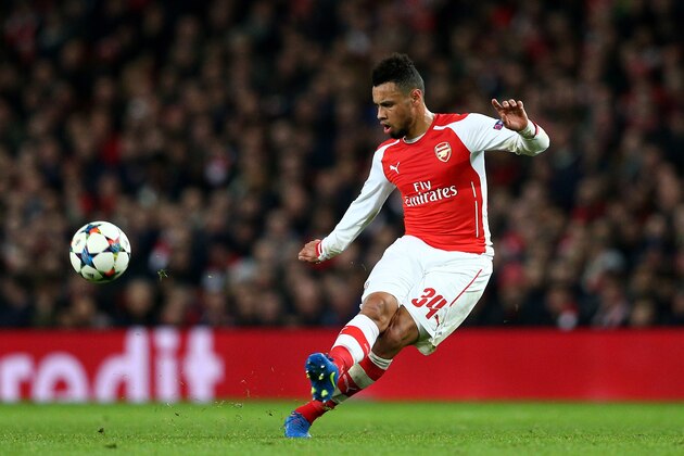 LONDON, ENGLAND - FEBRUARY 25:  Francis Coquelin of Arsenal passes the ball during the UEFA Champions League round of 16, first leg match between Arsenal and Monaco at The Emirates Stadium on February 25, 2015 in London, United Kingdom.  (Photo by Clive Mason/Getty Images)