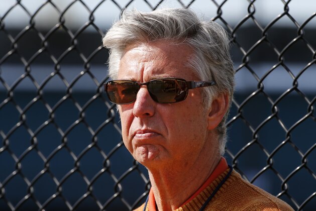 Detroit Tigers General Manager David Dombrowski watches a baseball spring training workout  in Lakeland, Fla., Saturday, Feb. 21, 2015.  (AP Photo/Gene J. Puskar)