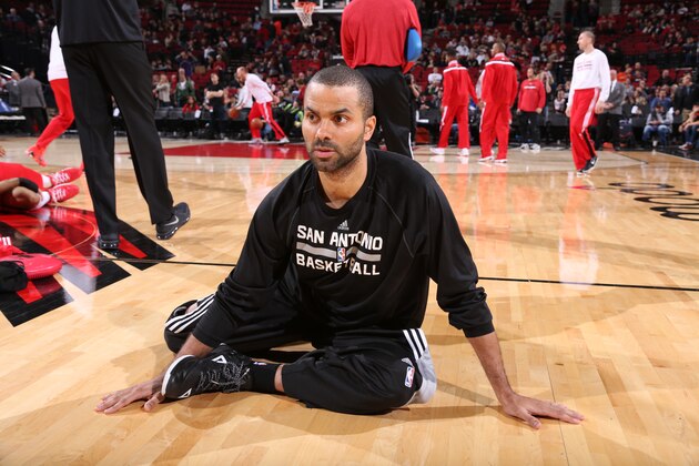 PORTLAND, OR - FEBRUARY 25: Tony Parker #9 of the San Antonio Spurs stretches before a game against the Portland Trail Blazers on February 25, 2015 at the Moda Center in Portland, Oregon. NOTE TO USER: User expressly acknowledges and agrees that, by downloading and or using this Photograph, user is consenting to the terms and conditions of the Getty Images License Agreement. Mandatory Copyright Notice: Copyright 2015 NBAE (Photo by Sam Forencich/NBAE via Getty Images)