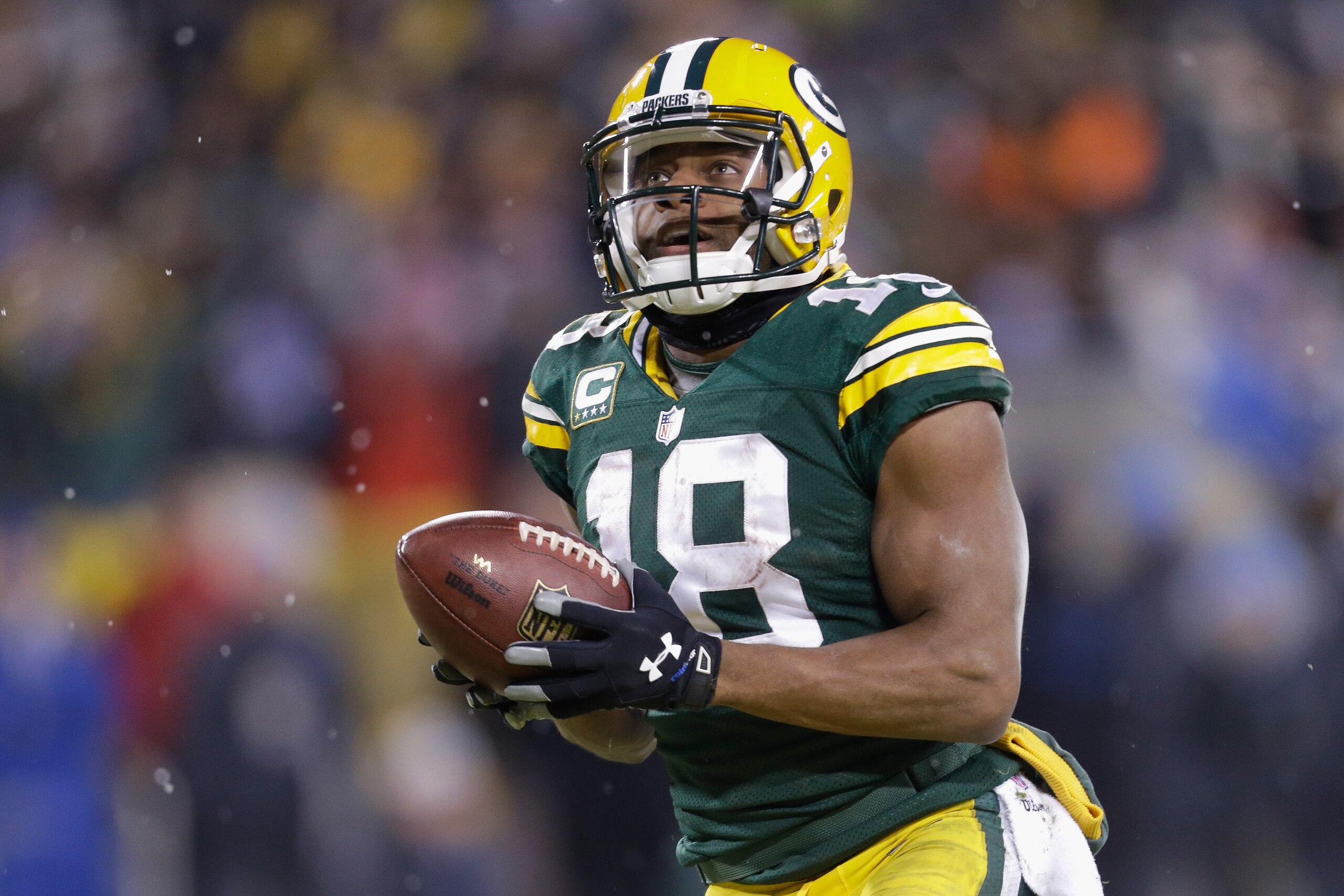 GREEN BAY, WI - DECEMBER 28:  Wide receiver Randall Cobb #18 of the Green Bay Packers reacts after scoring in the third quarter for his second touchdown against the Detroit Lions during the NFL game at Lambeau Field on December 28, 2014 in Green Bay, Wisconsin.  (Photo by Mike McGinnis/Getty Images)