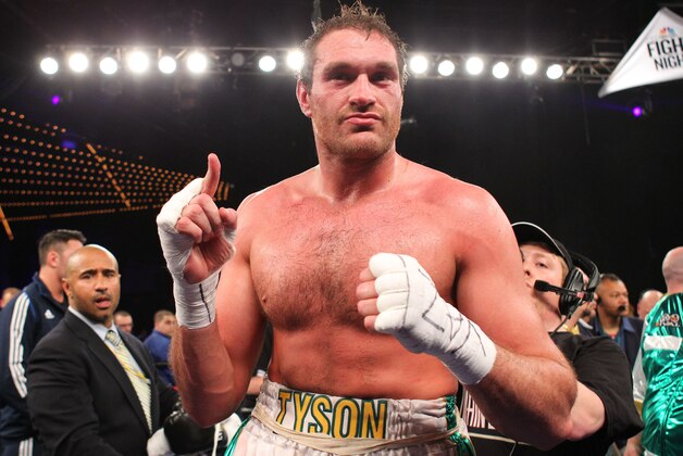 Apr 20, 2013; New York, NY, USA; Tyson Fury celebrates his 7th round knockout heavyweight bout win over Steve Cunningham at the Theater at Madison Square Garden. Mandatory Credit: Ed Mulholland-USA TODAY Sports