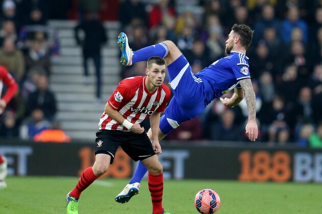 SOUTHAMPTON, ENGLAND - JANUARY 04:  Daryl Murphy of Ipswich Town leaps above Morgan Schneiderlin of Southampton during the FA Cup Third Round match between Southampton and Ipswich Town at St Mary's Stadium on January 4, 2015 in Southampton, England.  (Photo by David Cannon/Getty Images)