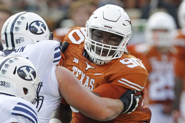 AUSTIN, TX - SEPTEMBER 6: Malcom Brown #90 of the Texas Longhorns makes a move against the BYU Cougars on September 6, 2014 at Darrell K Royal-Texas Memorial Stadium in Austin, Texas. (Photo by Chris Covatta/Getty Images)