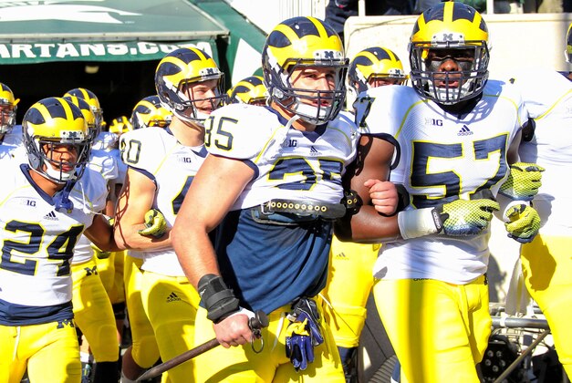 Oct 25, 2014; East Lansing, MI, USA; Michigan Wolverines linebacker Joe Bolden (35) enter the stadium carrying a metal tent stake prior to a game at Spartan Stadium. Mandatory Credit: Mike Carter-USA TODAY Sports