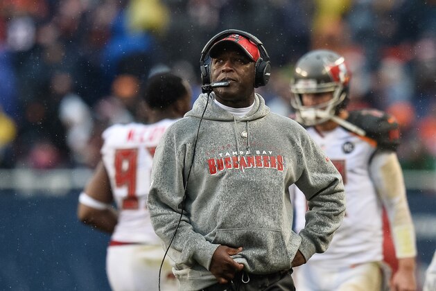 CHICAGO, IL - NOVEMBER 23:  Head coach Lovie Smith of the Tampa Bay Buccaneers looks at the scoreboard after the Chicago Bears recovered a fumble at Soldier Field on November 23, 2014 in Chicago, Illinois.  (Photo by Brian Kersey/Getty Images)