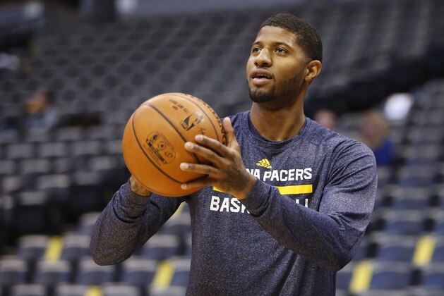 Dec 20, 2014; Denver, CO, USA; Indiana Pacers forward Paul George (13) before the game against the Denver Nuggets at Pepsi Center. Mandatory Credit: Chris Humphreys-USA TODAY Sports
