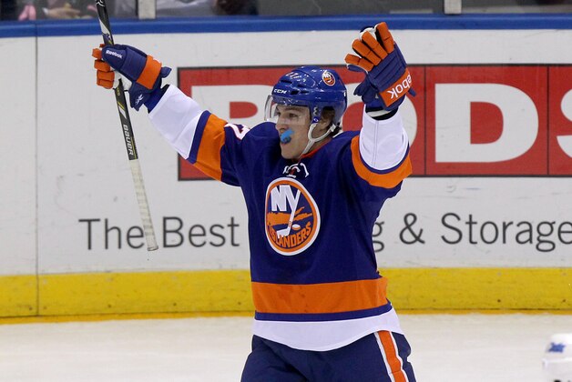 Apr 2, 2013; Uniondale, NY, USA; New York Islanders center Anders Lee (27) reacts after scoring his first career goal during the first period of his first career game during the first period of an NHL game against the Winnipeg Jets at Nassau Veterans Memorial Coliseum. Mandatory Credit: Brad Penner-USA TODAY Sports