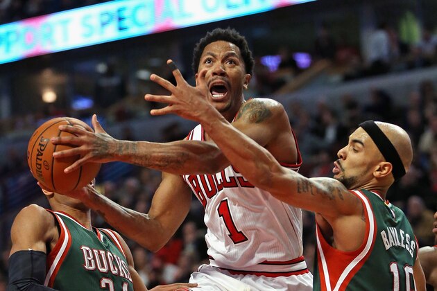 CHICAGO, IL - FEBRUARY 23: Derrick Rose #1 of the Chicago Bulls drives between Giannis Antetokounmpo #34 and Jerryd Bayless #19 of the Milwaukee Bucks at the United Center on February 23, 2015 in Chicago, Illinois. The Bulls defeated the Bucks 87-71. NOTE TO USER: User expressly acknowledges and agrees that, by downloading and or using this photograph, User is consenting to the terms and conditions of the Getty Images License Agreement. (Photo by Jonathan Daniel/Getty Images)