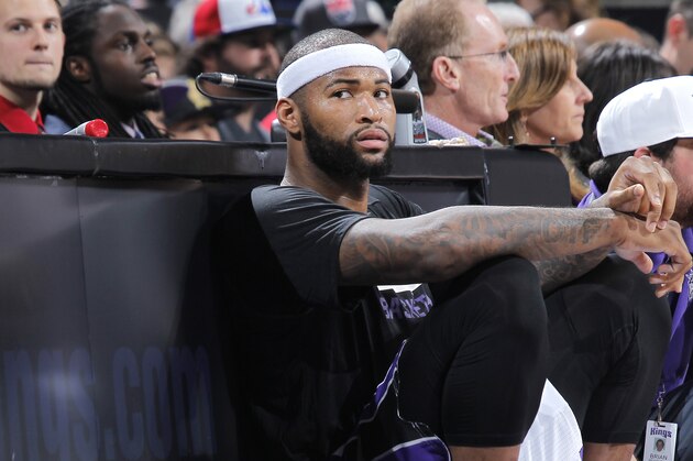 SACRAMENTO, CA - FEBRUARY 20: DeMarcus Cousins #15 of the Sacramento Kings waits to check into the game against the Boston Celtics on February 20, 2015 at Sleep Train Arena in Sacramento, California. NOTE TO USER: User expressly acknowledges and agrees that, by downloading and or using this photograph, User is consenting to the terms and conditions of the Getty Images Agreement. Mandatory Copyright Notice: Copyright 2015 NBAE (Photo by Rocky Widner/NBAE via Getty Images)