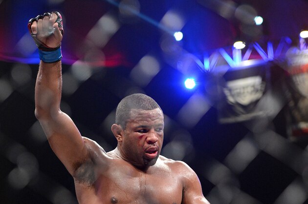 Nov 2, 2013; Long Beach, CA, USA;   Emanuel Newton (blue gloves) after winning his Bellator Interim Light Heavyweight World Title Fight against Muhammed Lawal (not pictured) at the Long Beach Arena.  Mandatory Credit: Jayne Kamin-Oncea-USA TODAY Sports