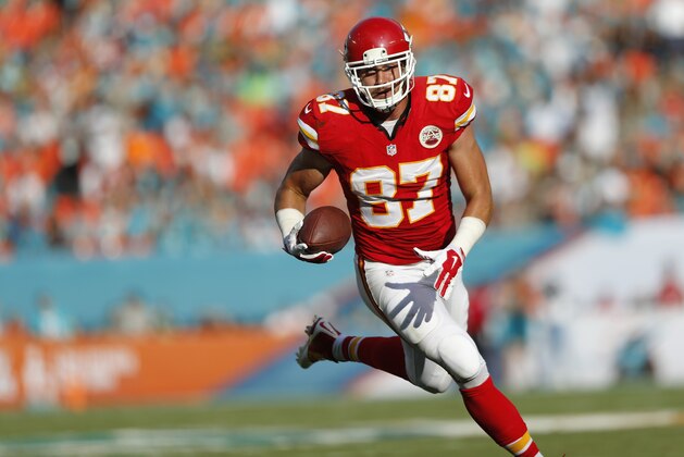 MIAMI GARDENS, FL - SEPTEMBER 21:  Tight end Travis Kelce #87 of the Kansas City Chiefs returns a turnover for a second-quarter touchdown against the Miami Dolphins during their game at Sun Life Stadium on September 21, 2014 in Miami Gardens, Florida.  (Photo by Joel Auerbach/Getty Images)