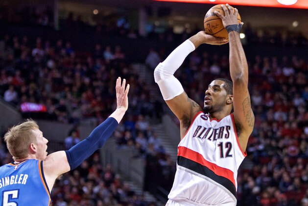 Feb 27, 2015; Portland, OR, USA; Portland Trail Blazers forward LaMarcus Aldridge (12) shoots over Oklahoma City Thunder forward Kyle Singler (5) during the first quarter at the Moda Center. Mandatory Credit: Craig Mitchelldyer-USA TODAY Sports