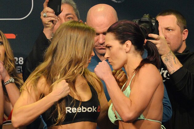 Feb 27, 2015; Los Angeles, CA, USA; Ronda Rousey and Cat Zingano face off at the weigh-in for their fight at UFC 184 at Staples Center. Mandatory Credit: Jayne Kamin-Oncea-USA TODAY Sports