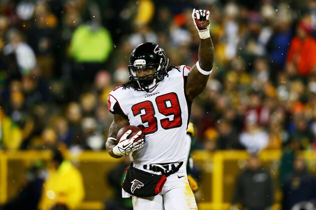 GREEN BAY, WI - DECEMBER 08:  Steven Jackson #39 of the Atlanta Falcons celebrates his touchdown in the first quarter against the Green Bay Packers at Lambeau Field on December 8, 2014 in Green Bay, Wisconsin.  (Photo by Kevin C. Cox/Getty Images)