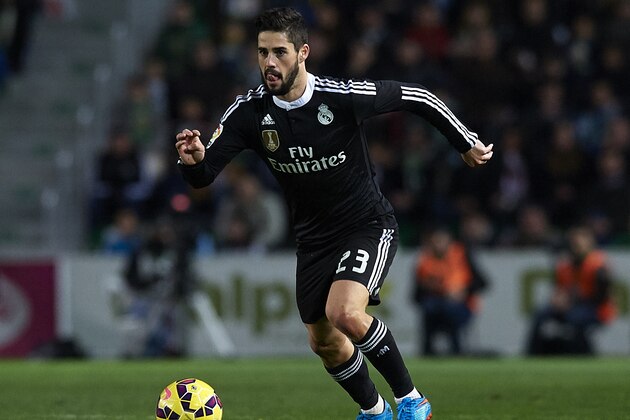 ELCHE, SPAIN - FEBRUARY 22:  Isco of Real Madrid runs with the ball during the La Liga match between Elche FC and Real Madrid at Estadio Manuel Martinez Valero on February 22, 2015 in Elche, Spain.  (Photo by Manuel Queimadelos Alonso/Getty Images)