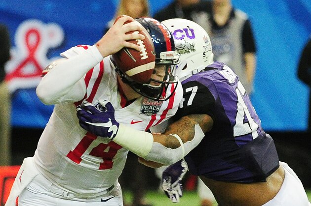 ATLANTA, GA - DECEMBER 31:  Paul Dawson #47 of the TCU Horned Frogs sacks Bo Wallace #14 of the Ole Miss Rebels in the fourth quarter during the Chik-fil-A Peach Bowl at Georgia Dome on December 31, 2014 in Atlanta, Georgia.  (Photo by Scott Cunningham/Getty Images)