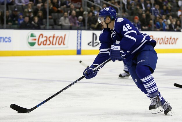 Feb 26, 2015; Toronto, Ontario, CAN; Toronto Maple Leafs forward Tyler Bozak (42) scores on a breakaway against the Philadelphia Flyers during the second period at the Air Canada Centre. Mandatory Credit: John E. Sokolowski-USA TODAY Sports