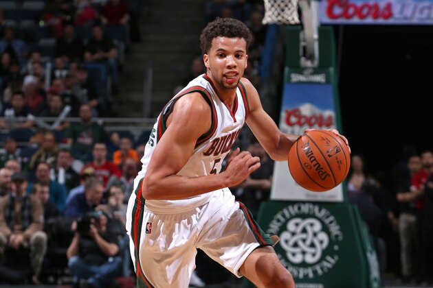 MILWAUKEE, WI -  FEBRUARY 25: Michael Carter-Williams #5 of the Milwaukee Bucks drives against the Philadelphia 76ers on February 25, 2015 at BMO Harris Bradley Center in Milwaukee, Wisconsin . NOTE TO USER: User expressly acknowledges and agrees that, by downloading and or using this Photograph, user is consenting to the terms and conditions of the Getty Images License Agreement. Mandatory Copyright Notice: Copyright 2015 NBAE (Photo by Gary Dineen/NBAE via Getty Images)