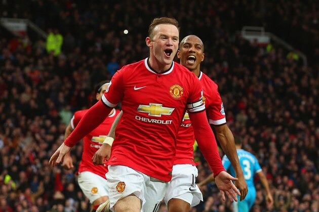 MANCHESTER, ENGLAND - FEBRUARY 28:  Wayne Rooney of Manchester United celebrates scoring the opening goal with Ashley Young of Manchester United during the Barclays Premier League match between Manchester United and Sunderland at Old Trafford on February 28, 2015 in Manchester, England.  (Photo by Alex Livesey/Getty Images)