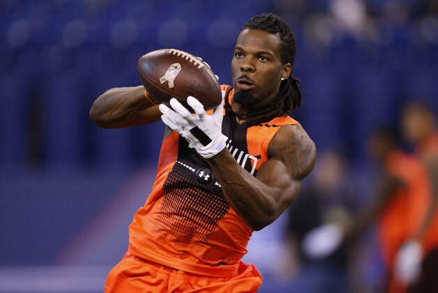 West Virginia wide receiver Kevin White runs a drill at the NFL football scouting combine in Indianapolis, Saturday, Feb. 21, 2015. (AP Photo/Julio Cortez)