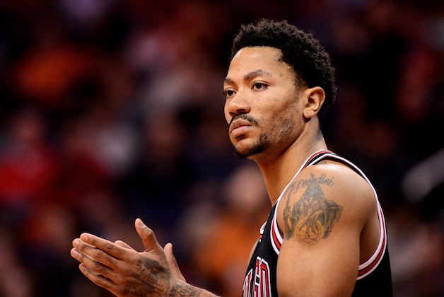 Jan 30, 2015; Phoenix, AZ, USA; Chicago Bulls guard Derrick Rose (1) reacts on the basketball court against the Phoenix Suns in the first half at US Airways Center. The Suns won 99-93. Mandatory Credit: Jennifer Stewart-USA TODAY Sports