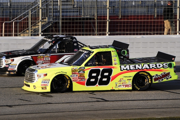 Matt Crafton (88) and Erik Jones (4) battle for position during NASCAR Trucks series auto race at Atlanta Motor Speedway Saturday, Feb. 28, 2015, in Hampton, Ga. (AP Photo/John Amis) Matt Crafton (88) and Erik Jones (4) battle for position during NASCAR Trucks series auto race at Atlanta Motor Speedway Saturday, Feb. 28, 2015, in Hampton, Ga. (AP Photo/John Amis)