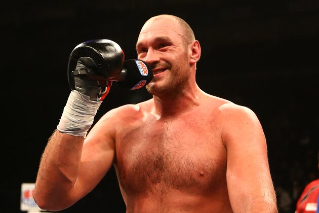 LONDON, ENGLAND - FEBRUARY 28:  Tyson Fury celebrates victory over Christian Hammer in a Heavyweight Contest by singing 'Elvis' at the O2 Arena on February 28, 2015 in London, England.  (Photo by Richard Heathcote/Getty Images)