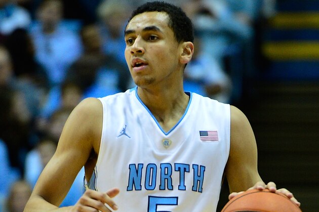 CHAPEL HILL, NC - DECEMBER 27:  Marcus Paige #5 of the North Carolina Tar Heels moves the ball against the UAB Blazers during their game at the Dean Smith Center on December 27, 2014 in Chapel Hill, North Carolina. North Carolina won 89-58.  (Photo by Grant Halverson/Getty Images)