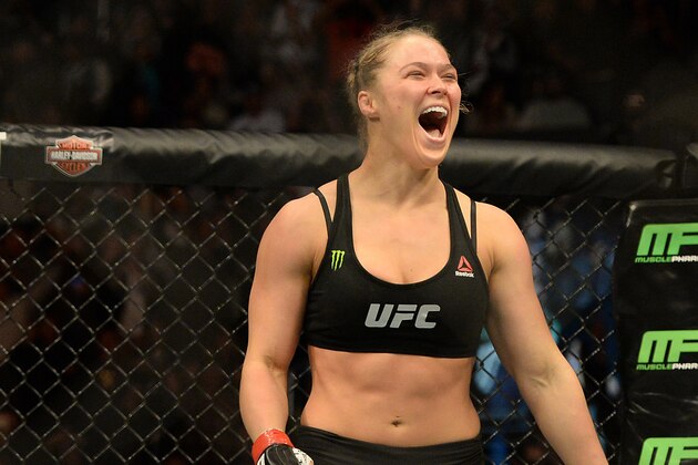 Feb 28, 2015; Los Angeles, CA, USA; Ronda Rousey (red gloves) reacts after defeating Cat Zingano (not pictured) during their women's bantamweight title bout at UFC 184 at Staples Center. Rousey won in 14 seconds of the first round. Mandatory Credit: Jayne Kamin-Oncea-USA TODAY Sports