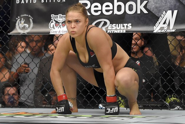 Ronda Rousey gets ready to fight Cat Zingano in a UFC 184 mixed martial arts bantamweight title bout, Saturday, Feb. 28, 2015, in Los Angeles. Rousey won after Zingano tapped out 14 seconds into the first round. (AP Photo/Mark J. Terrill)