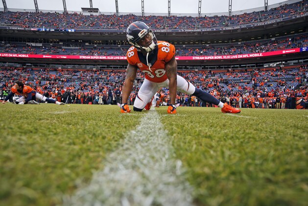 Denver Broncos wide receiver Demaryius Thomas (88) stretches prior to an NFL divisional playoff football game against the Indianapolis Colts, Sunday, Jan. 11, 2015, in Denver. (AP Photo/Jack Dempsey)