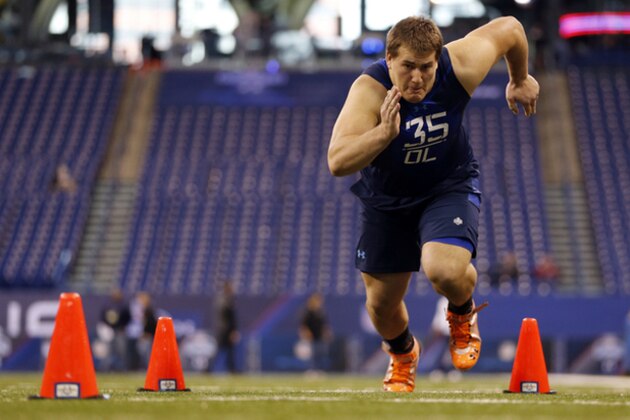 Hobart offensive lineman Ali Marpet runs a drill at the NFL football scouting combine in Indianapolis, Friday, Feb. 20, 2015. (AP Photo/Julio Cortez)