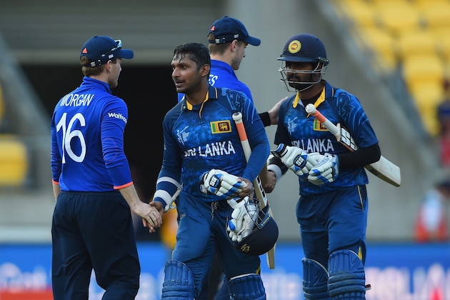WELLINGTON, NEW ZEALAND - MARCH 01:  Kumar Sangakkara of Sri Lanka shakes hands with England captain Eoin Morgan at the end of the 2015 ICC Cricket World Cup match between England and Sri Lanka at Wellington Regional Stadium on March 1, 2015 in Wellington, New Zealand.  (Photo by Shaun Botterill/Getty Images)