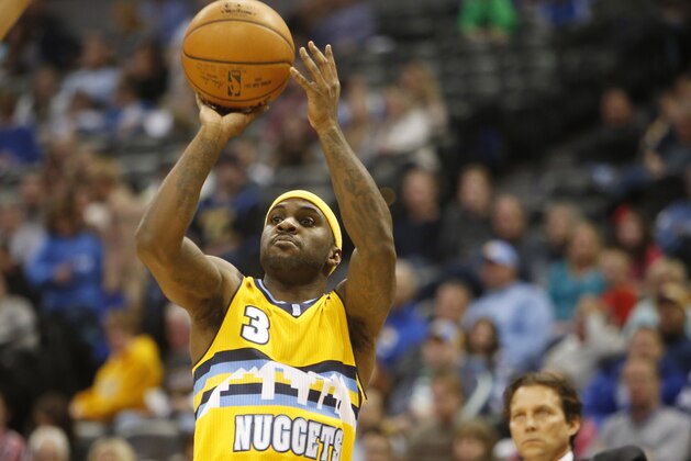 Feb 27, 2015; Denver, CO, USA; Denver Nuggets guard Ty Lawson (3) shoots the ball during the first half against the Utah Jazz at Pepsi Center. Mandatory Credit: Chris Humphreys-USA TODAY Sports