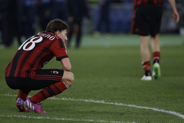AC Milan's Riccardo Montolivo looks on at the end of a Serie A soccer match between Lazio and AC Milan in Rome's Olympic stadium, Saturday, Jan. 24, 2015. (AP Photo/Gregorio Borgia)