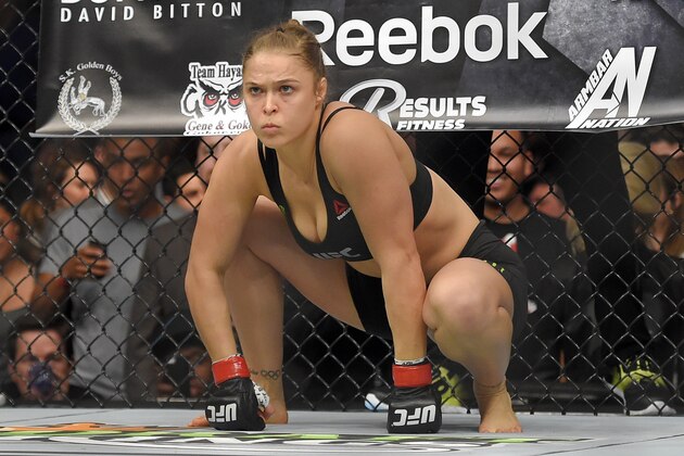 Ronda Rousey gets ready to fight Cat Zingano in a UFC 184 mixed martial arts bantamweight title bout, Saturday, Feb. 28, 2015, in Los Angeles. Rousey won after Zingano tapped out 14 seconds into the first round. (AP Photo/Mark J. Terrill)