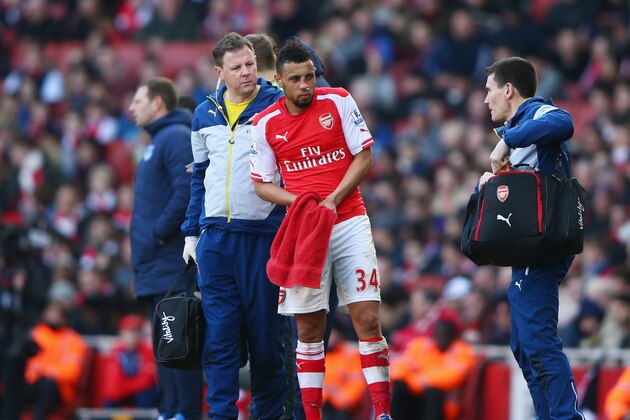 LONDON, ENGLAND - MARCH 01:  Francis Coquelin of Arsenal stands on the touchline after treatment during the Barclays Premier League match between Arsenal and Everton at Emirates Stadium on March 1, 2015 in London, England.  (Photo by Ian Walton/Getty Images)