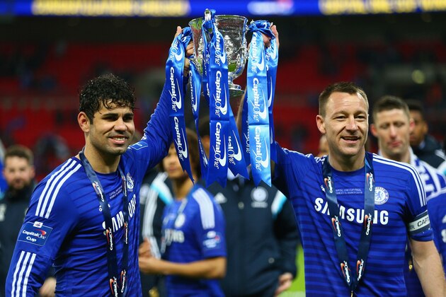 LONDON, ENGLAND - MARCH 01: Diego Costa and John Terry of Chelsea pose with the trophy during the Capital One Cup Final match between Chelsea and Tottenham Hotspur at Wembley Stadium on March 1, 2015 in London, England.  (Photo by Clive Mason/Getty Images)