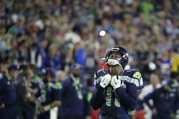 Seattle Seahawks cornerback Byron Maxwell (41) stands on the field during the second half of NFL Super Bowl XLIX football game against the New England Patriots on Sunday, Feb. 1, 2015, in Glendale, Ariz. (AP Photo/Kathy Willens)