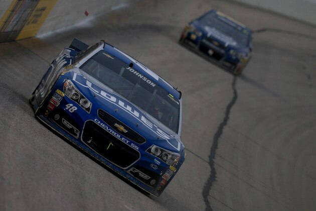 HAMPTON, GA - MARCH 01:  Jimmie Johnson, driver of the #48 Lowe's Chevrolet, leads the field during the NASCAR Sprint Cup Series Folds of Honor QuikTrip 500 at Atlanta Motor Speedway on March 1, 2015 in Hampton, Georgia.  (Photo by Brian Lawdermilk/Getty Images)