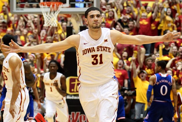 Jan 17, 2015; Ames, IA, USA; Iowa State Cyclones forward Georges Niang (31) signals a three pointer to the crowd during their game against the Kansas Jayhawks at James H. Hilton Coliseum. Iowa State beat Kansas 86-81.  Mandatory Credit: Reese Strickland-USA TODAY Sports