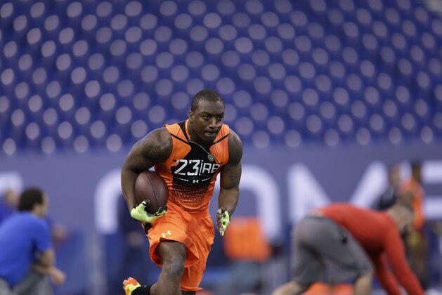 Miami running back Duke Johnson runs a drill at the NFL football scouting combine in Indianapolis, Saturday, Feb. 21, 2015. (AP Photo/David J. Phillip)