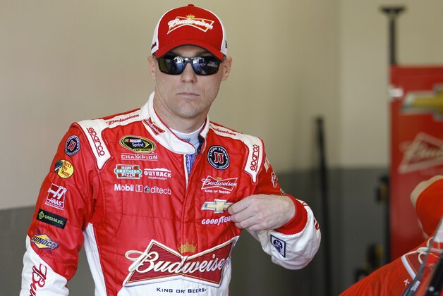 Kevin Harvick prepares for a practice session for the Daytona 500 NASCAR Sprint Cup Series auto race at Daytona International Speedway, Wednesday, Feb. 18, 2015, in Daytona Beach, Fla. (AP Photo/Terry Renna)